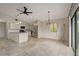 Modern kitchen featuring granite countertops and stainless steel appliances at 6468 Engram Rd, New Smyrna Beach, FL 32169