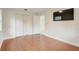 Bedroom with hardwood floors and a large closet at 6468 Engram Rd, New Smyrna Beach, FL 32169