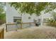 Wooden deck with seating area and shade at 6468 Engram Rd, New Smyrna Beach, FL 32169