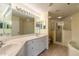Double vanity bathroom with soaking tub and shower at 5300 S Atlantic Ave # 8502, New Smyrna Beach, FL 32169
