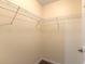 Spacious closet with wire shelving; provides ample storage at 5300 S Atlantic Ave # 8502, New Smyrna Beach, FL 32169