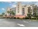 Condo building exterior, featuring light beige and blue accents at 5300 S Atlantic Ave # 8502, New Smyrna Beach, FL 32169