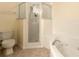 Clean bathroom with shower and tub at 5300 S Atlantic Ave # 8502, New Smyrna Beach, FL 32169