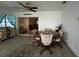 Sunroom with round dining table and chairs at 806 E 2Nd Ave, New Smyrna Beach, FL 32169