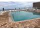 Inviting oceanfront pool with ample lounge chairs at 4811 Saxon # A201, New Smyrna Beach, FL 32169