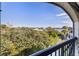 Stunning view of the waterfront with lush greenery and a walking path at 135 Marina Bay Dr # 135, New Smyrna Beach, FL 32169