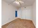 Well-lit bedroom featuring carpet flooring and a large closet at 5300 S Atlantic Ave # 9201, New Smyrna Beach, FL 32169