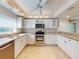 Updated kitchen with granite countertops and stainless steel appliances at 5300 S Atlantic Ave # 9201, New Smyrna Beach, FL 32169