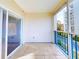 Spacious balcony with tiled flooring and sliding glass doors at 5300 S Atlantic Ave # 9201, New Smyrna Beach, FL 32169