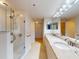 Bathroom boasts double vanity, granite countertop, and a large shower at 5300 S Atlantic Ave # 9201, New Smyrna Beach, FL 32169