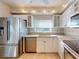Modern kitchen with stainless steel appliances and granite countertops at 5300 S Atlantic Ave # 9201, New Smyrna Beach, FL 32169