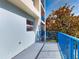 Spacious balcony with blue railings offering a pleasant outdoor space at 5300 S Atlantic Ave # 9201, New Smyrna Beach, FL 32169