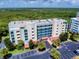Multi-story condominium building with parking and waterfront views at 5300 S Atlantic Ave # 9201, New Smyrna Beach, FL 32169