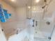 Bathroom features a corner bathtub and walk-in shower at 5300 S Atlantic Ave # 9201, New Smyrna Beach, FL 32169