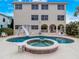 Large kidney-shaped pool with spa and slide at 610 S Atlantic Ave, New Smyrna Beach, FL 32169