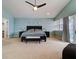 Large main bedroom with king bed and private access to balcony at 610 S Atlantic Ave, New Smyrna Beach, FL 32169
