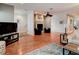 Living room with hardwood floors, fireplace, and comfortable seating at 610 S Atlantic Ave, New Smyrna Beach, FL 32169