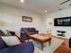 Game room with pool table, sitting area and bathroom access at 610 S Atlantic Ave, New Smyrna Beach, FL 32169