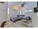 Charming bedroom with twin beds and ceiling fan at 830 Maralyn Ave, New Smyrna Beach, FL 32169
