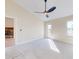 Bright bedroom with carpeted floors, fireplace view, and French doors at 804 Soft Pine Ct, New Smyrna Beach, FL 32168