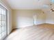 Bright living room with hardwood floors and access to backyard at 804 Soft Pine Ct, New Smyrna Beach, FL 32168