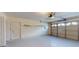 Attached garage with shelving and an automatic door opener at 804 Soft Pine Ct, New Smyrna Beach, FL 32168