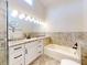 Bathroom featuring a soaking tub and a large walk-in shower at 804 Soft Pine Ct, New Smyrna Beach, FL 32168