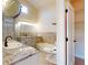 Bathroom with granite countertop, double vanity, and a large walk-in shower at 804 Soft Pine Ct, New Smyrna Beach, FL 32168