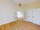 Spacious bedroom with light flooring and French doors at 804 Soft Pine Ct, New Smyrna Beach, FL 32168