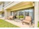 Relaxing patio with seating area, perfect for outdoor enjoyment at 4501 S Atlantic Ave # 1210, New Smyrna Beach, FL 32169