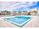 Inviting community pool with ample deck space for lounging at 4501 S Atlantic Ave # 1210, New Smyrna Beach, FL 32169