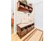 Entryway with bench, storage, and beach themed decor at 4501 S Atlantic Ave # 1210, New Smyrna Beach, FL 32169