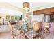 Open concept dining room with kitchen and living room access at 4501 S Atlantic Ave # 1210, New Smyrna Beach, FL 32169