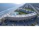Aerial view of building and parking lot near the beach at 4501 S Atlantic Ave # 1210, New Smyrna Beach, FL 32169