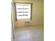 Bright bedroom with window and air conditioner at 226 Wildwood Ave, Edgewater, FL 32132