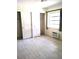 Simple bedroom with tile floor and mirrored closet at 226 Wildwood Ave, Edgewater, FL 32132