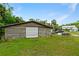 Property with detached outbuilding and main house at 1795 Hideaway Ln, Edgewater, FL 32141