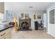 Open living room with high ceilings, featuring a comfortable seating area and large windows at 1795 Hideaway Ln, Edgewater, FL 32141