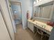 Bathroom with vanity, sink and toilet at 151 Breezeway Ct, New Smyrna Beach, FL 32169