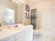 Clean bathroom with shower/tub combo and white vanity at 2700 N Peninsula Ave # 536, New Smyrna Beach, FL 32169