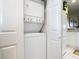 Stackable washer and dryer in a closet at 2700 N Peninsula Ave # 536, New Smyrna Beach, FL 32169
