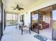 Relaxing balcony with seating and access to living room at 2700 N Peninsula Ave # 536, New Smyrna Beach, FL 32169