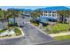 Condo community entrance with gated access and landscaping at 2700 N Peninsula Ave # 536, New Smyrna Beach, FL 32169