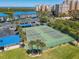 Two well-maintained tennis courts at 2700 N Peninsula Ave # 536, New Smyrna Beach, FL 32169