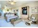 Open living room with sofa, wicker coffee table, and view into dining area at 2700 N Peninsula Ave # 536, New Smyrna Beach, FL 32169