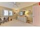 Home office or bedroom with window and built-in desk at 3001 S Atlantic Ave # 502, New Smyrna Beach, FL 32169