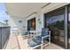 Relax on this furnished balcony, perfect for outdoor enjoyment at 3001 S Atlantic Ave # 502, New Smyrna Beach, FL 32169