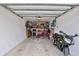 Garage with shelving, bicycle storage, and motorcycle at 3001 S Atlantic Ave # 502, New Smyrna Beach, FL 32169