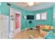 Cozy sitting area with comfy chairs and access to hallway at 3001 S Atlantic Ave # 502, New Smyrna Beach, FL 32169