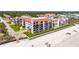 Aerial view of beachfront condo building with parking and beach access at 3001 S Atlantic Ave # 502, New Smyrna Beach, FL 32169